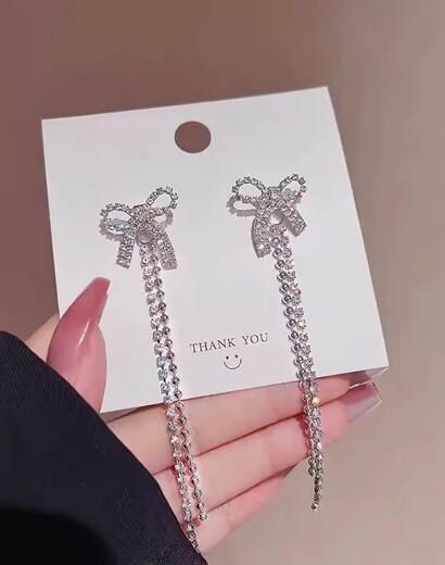 Diamond bow earrings